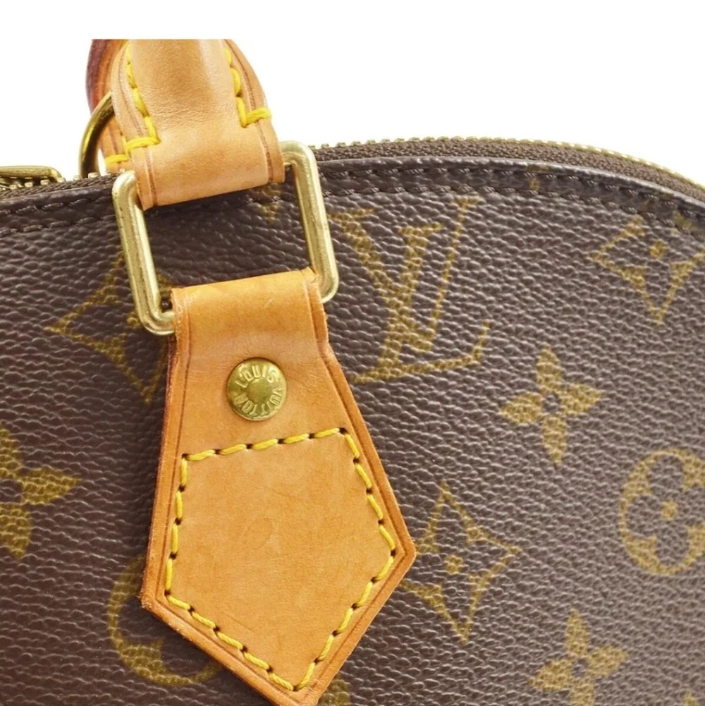 LOUIS VUITTON Alma Monogram Handbag - Picture 7 of 9